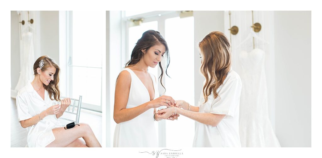 bridesmaid helps bride with jewelry by Gurney's Newport Resort wedding day with Sara Zarrella Photography