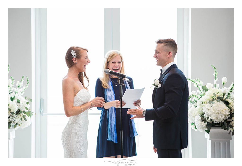 bride and groom exchange vows photographed by Sara Zarrella Photography