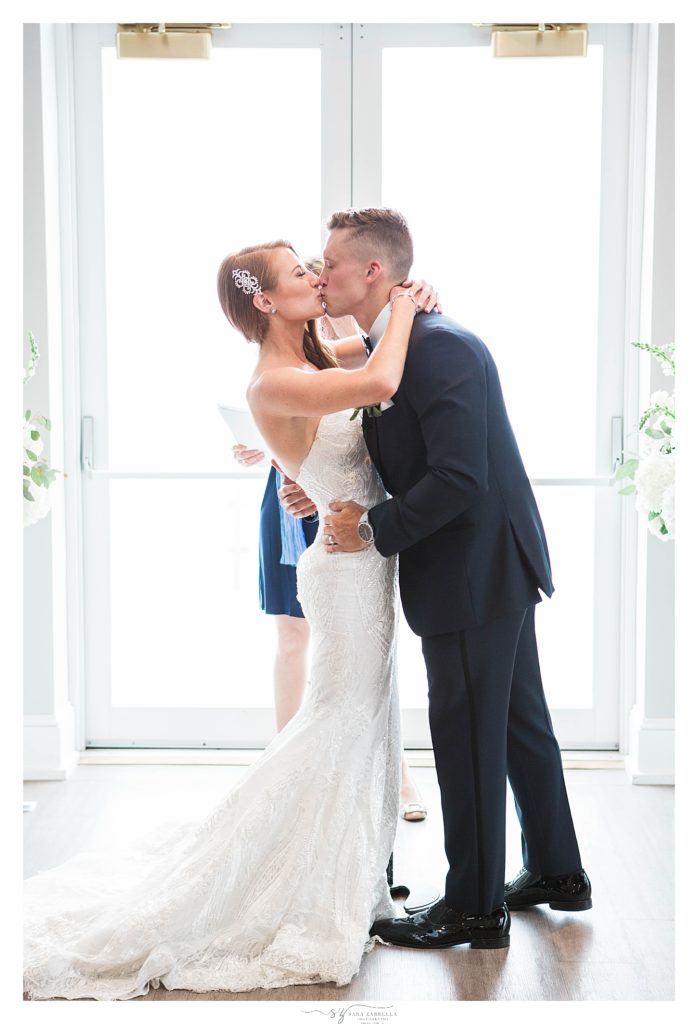 first kiss as newlyweds photographed by Sara Zarrella Photography