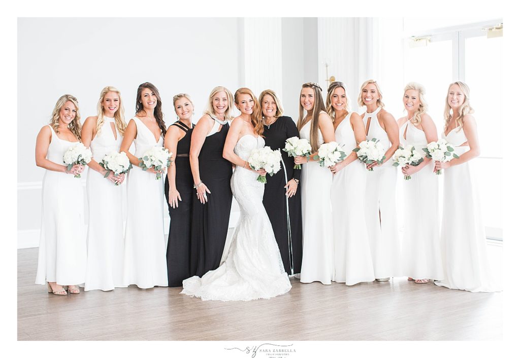 bridesmaids in all white photographed by Sara Zarrella Photography