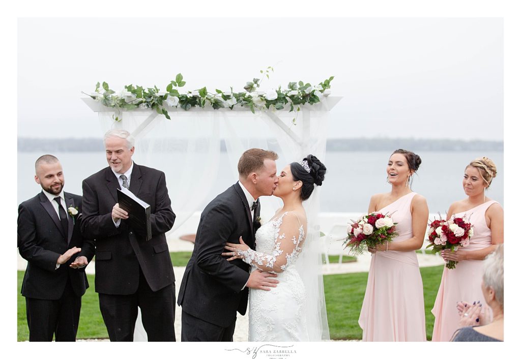 first kiss at Island House wedding photographed by Newport RI wedding photographer Sara Zarrella Photography