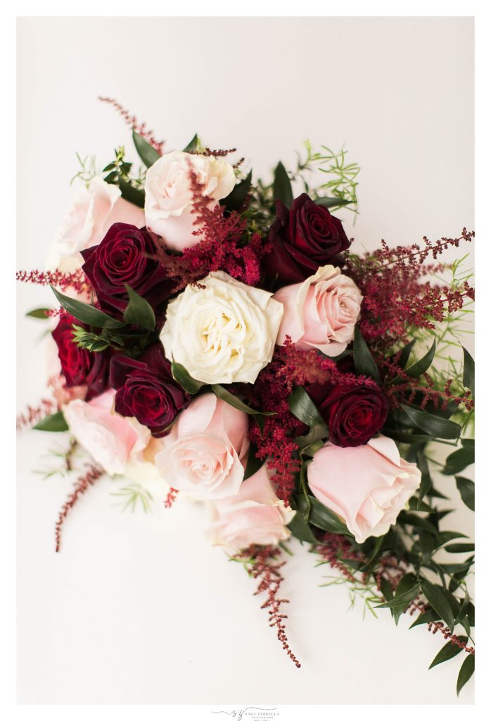 red, ivory, and pink bouquet photographed by wedding photographer Sara Zarrella Photography