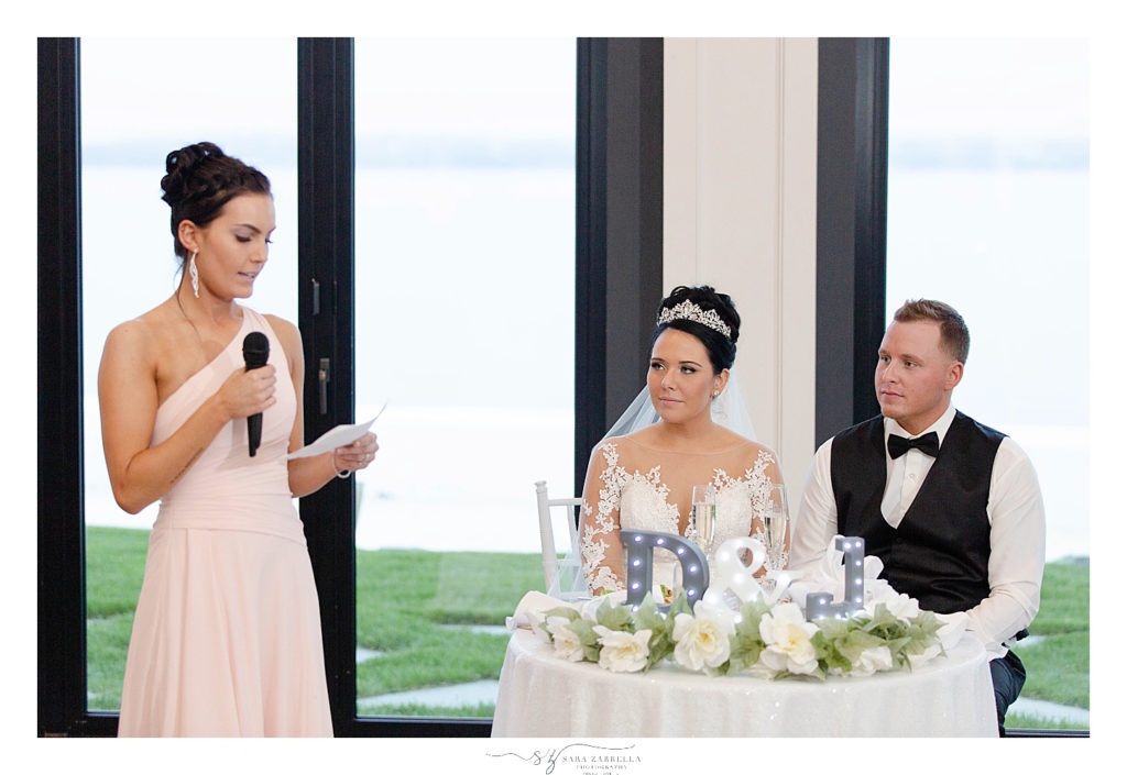 bridesmaid gives toast at Island House wedding day photographed by wedding photographer Sara Zarrella Photography