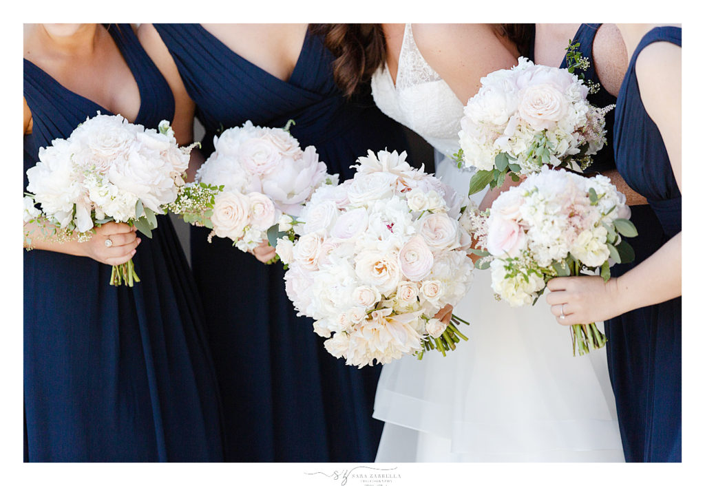 ivory and blush wedding bouquets photographed by Sara Zarrella Photography