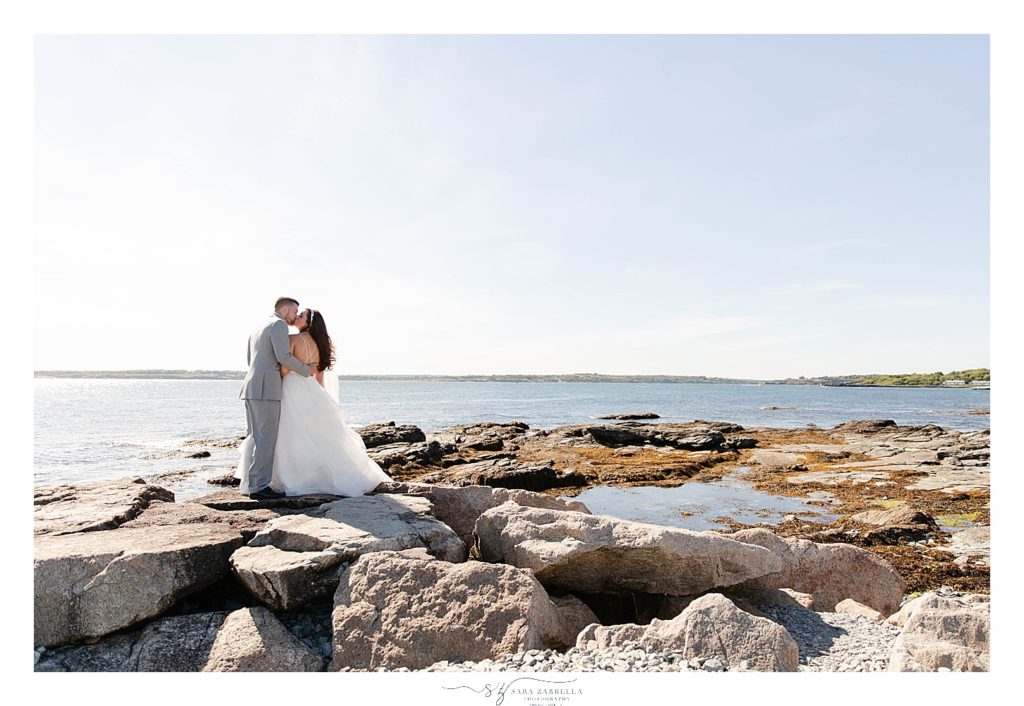 romantic wedding portraits on beach rocks by Sara Zarrella Photography