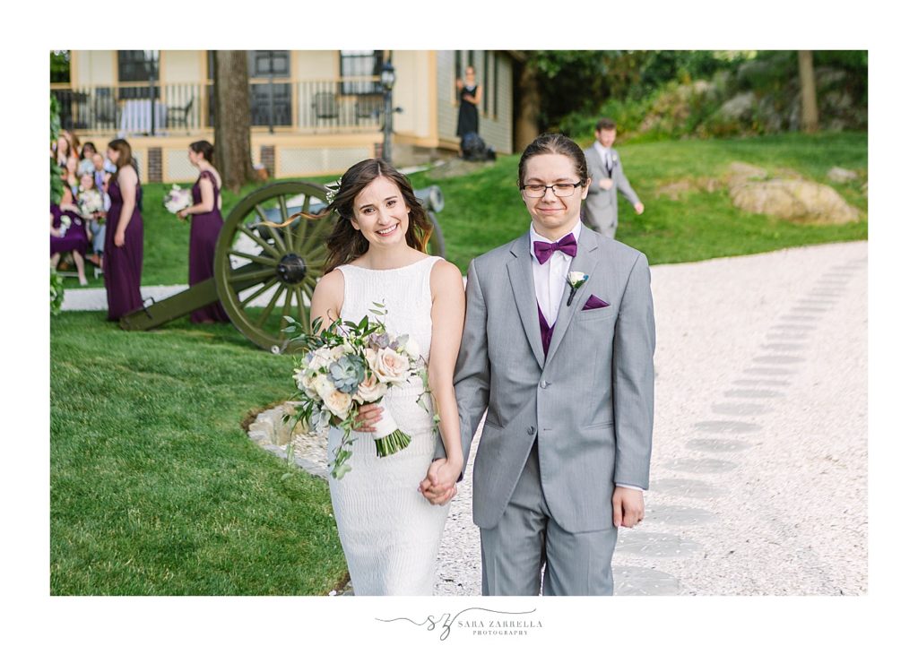 happy couple after ceremony at Squantum Association photographed by Sara Zarrella Photography