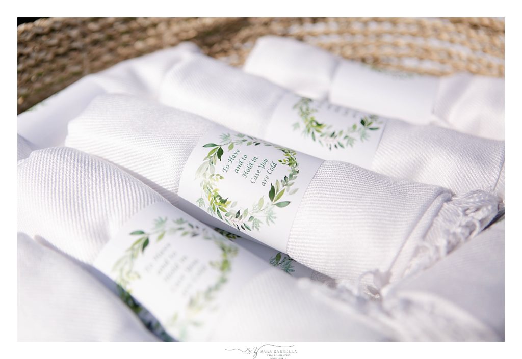 thoughtful ceremony favors for outdoor wedding at Gurney's photographed by Sara Zarrella Photography