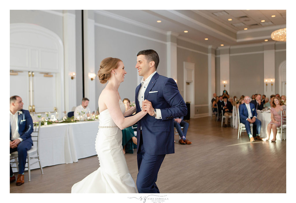 newlyweds enjoy first dance on wedding day at Gurney's with Sara Zarrella Photography