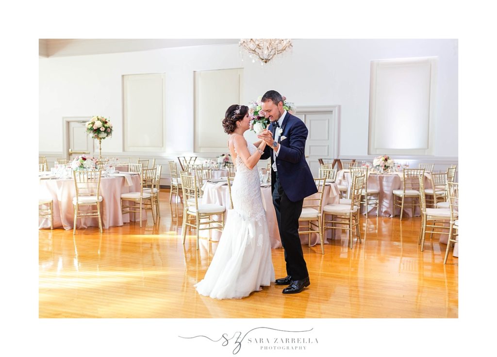 bride and groom practice first dance with Sara Zarrella Photography