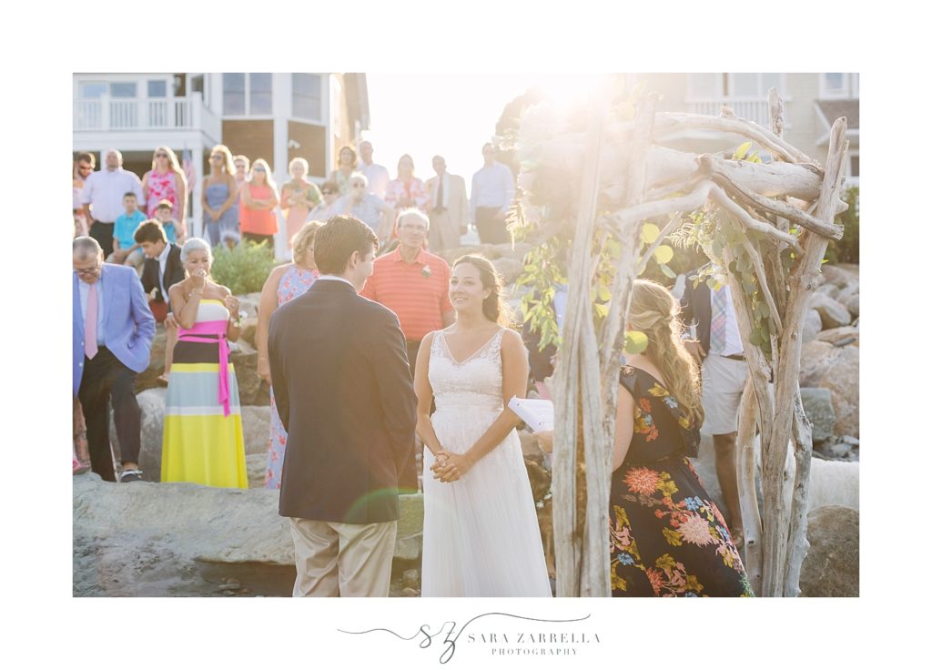 oceanfront wedding ceremony photographed by Sara Zarrella Photography