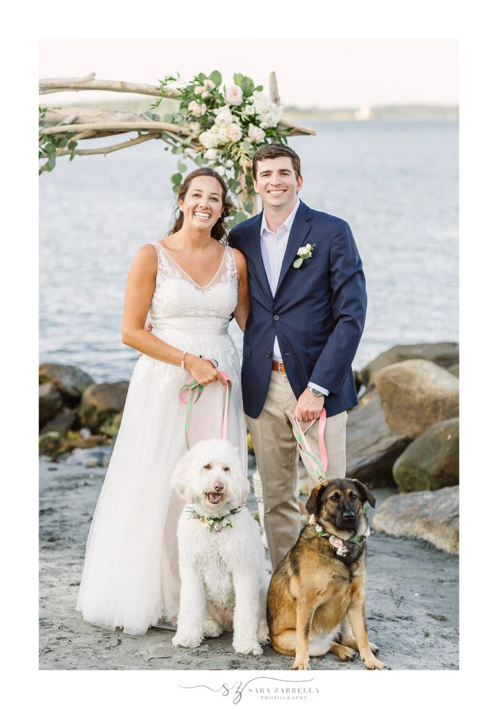 bride and groom with dogs in RI with Sara Zarrella Photography