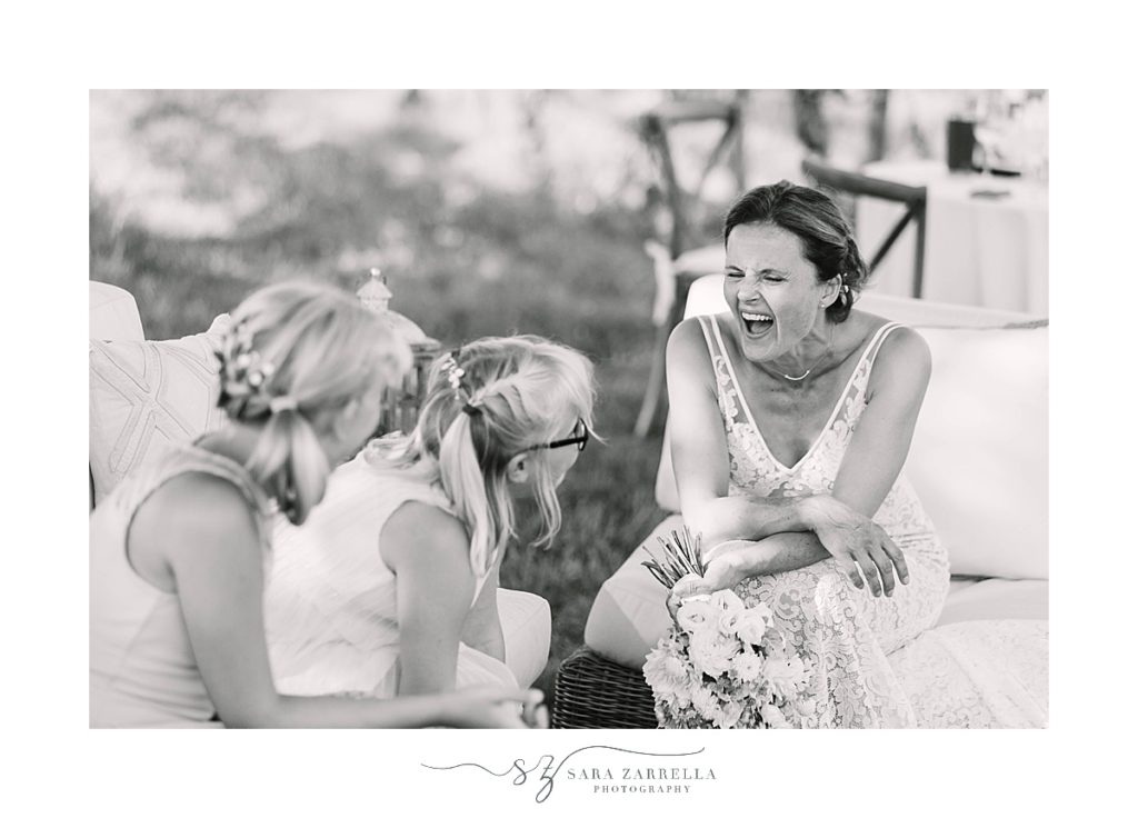 bride on wedding day with family photographed by Sara Zarrella Photography