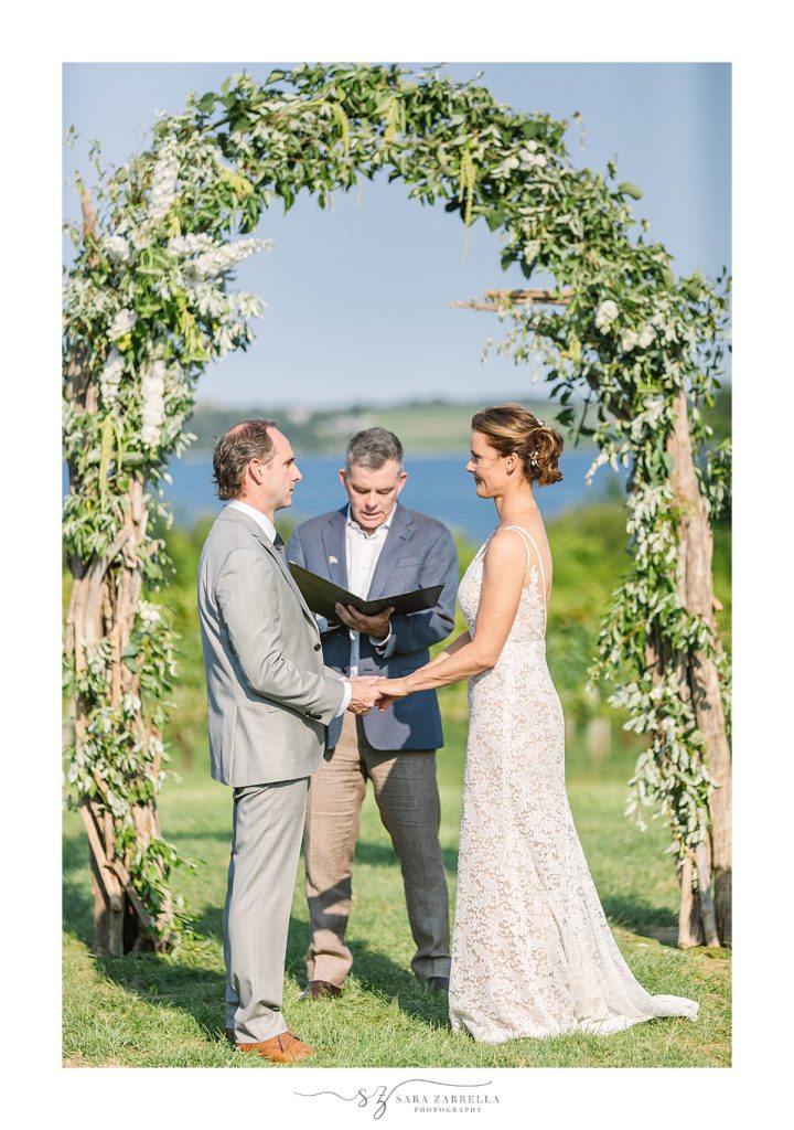romantic wedding ceremony in the vines with Sara Zarrella Photography