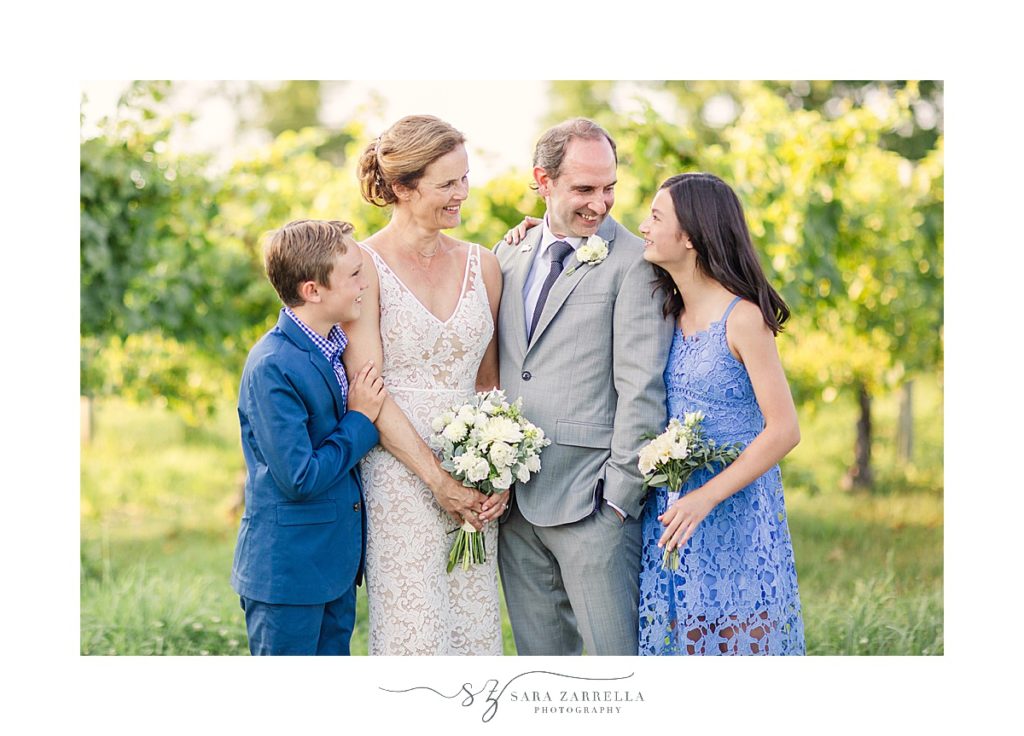 new family on wedding day photographed by Sara Zarrella Photography