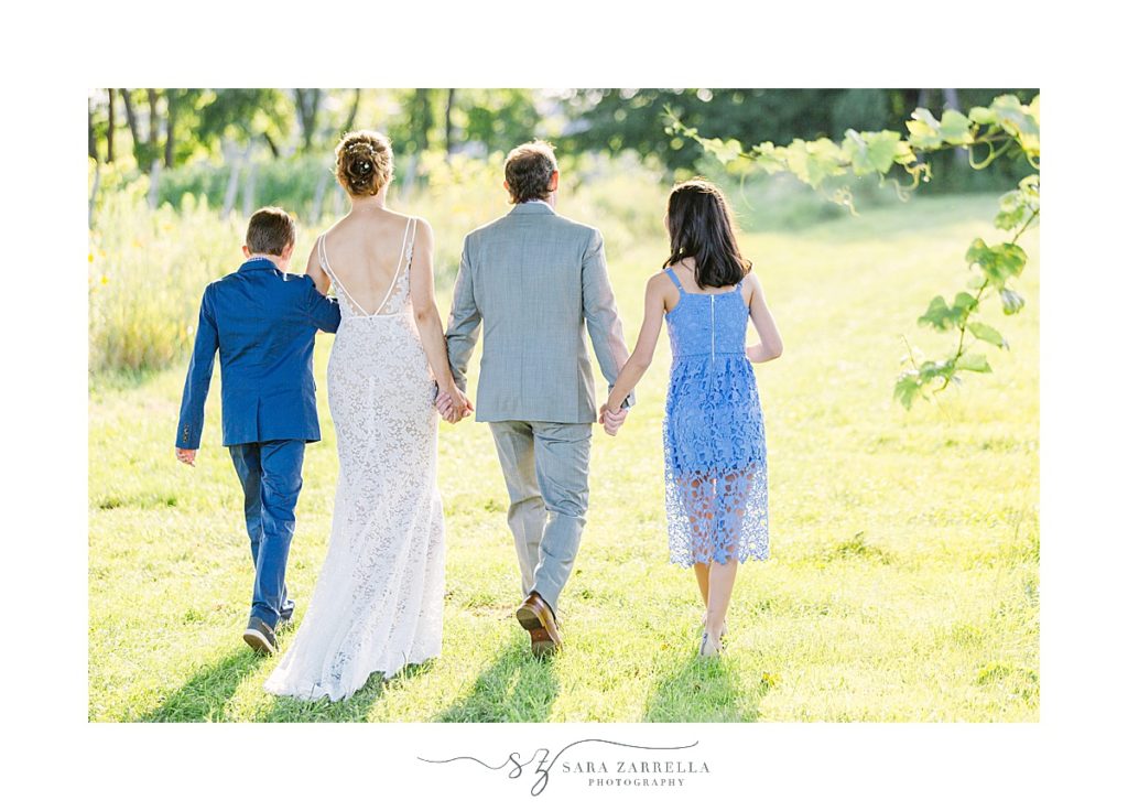 new family on wedding day at winery in Rhode Island by Sara Zarrella Photography