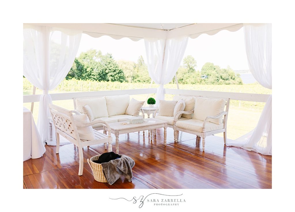tented wedding reception seating photographed by Sara Zarrella Photography