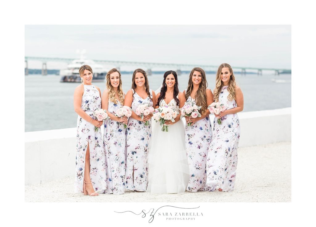 bridesmaids in floral dresses photographed by Sara Zarrella Photography
