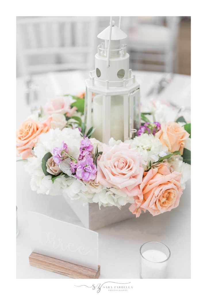 lighthouse with pastel florals for centerpieces by Sara Zarrella Photography