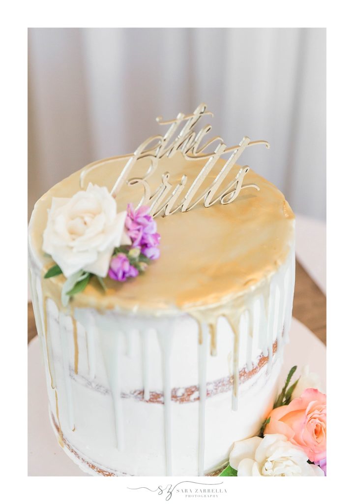 cake with gold top and drip icing photographed by Sara Zarrella Photography
