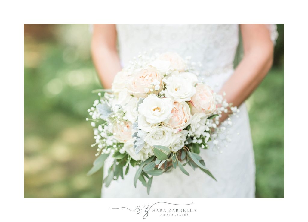 all-white wedding bouquet photographed by Rhode Island photo novelist Sara Zarrella Photography
