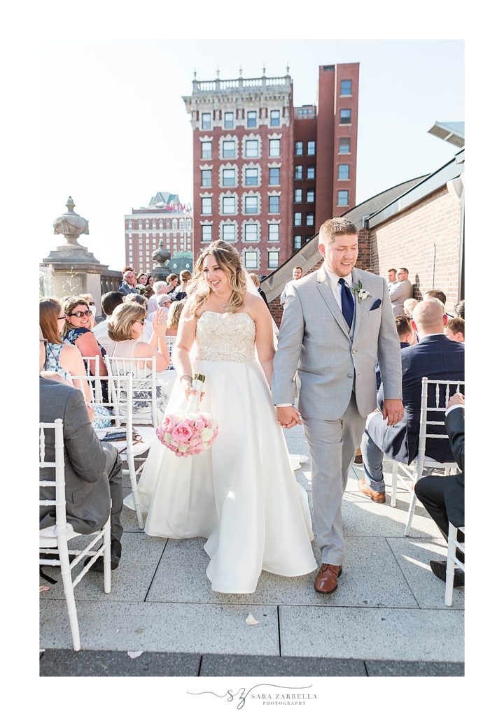 Sara Zarrella Photography photographs couple walking up the aisle at Providence G