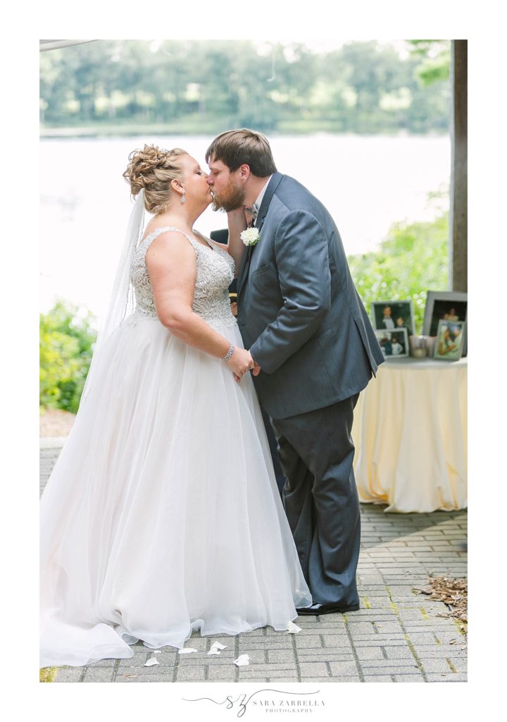 first kiss as husband and wife photographed by Sara Zarrella Photography