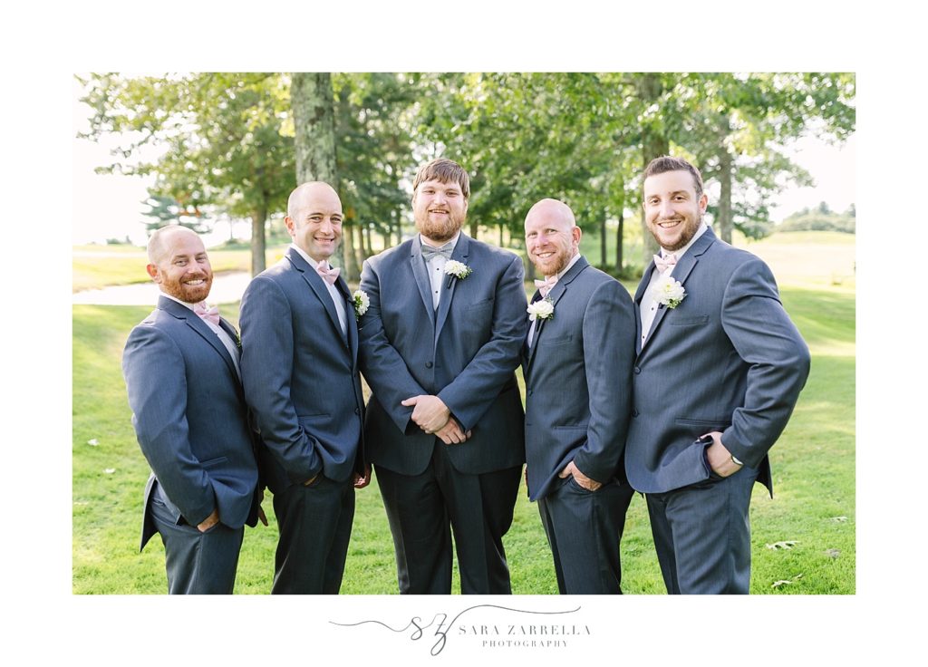 groom and groomsmen pose for Sara Zarrella Photography