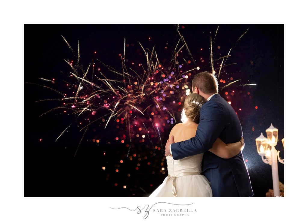 wedding portraits in Newport RI with Sara Zarrella Photography with fireworks over Goat Island