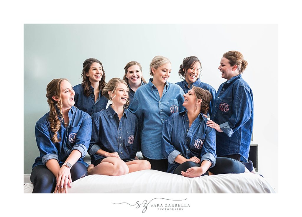 bride and bridesmaids get ready for Newport RI in matching monogrammed shirts with Sara Zarrella Photography