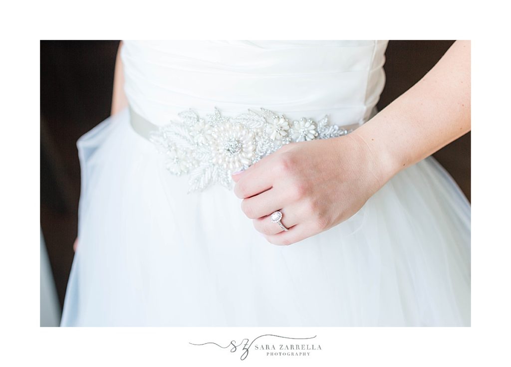 bride's wedding dress and ring details photographed by Sara Zarrella Photography