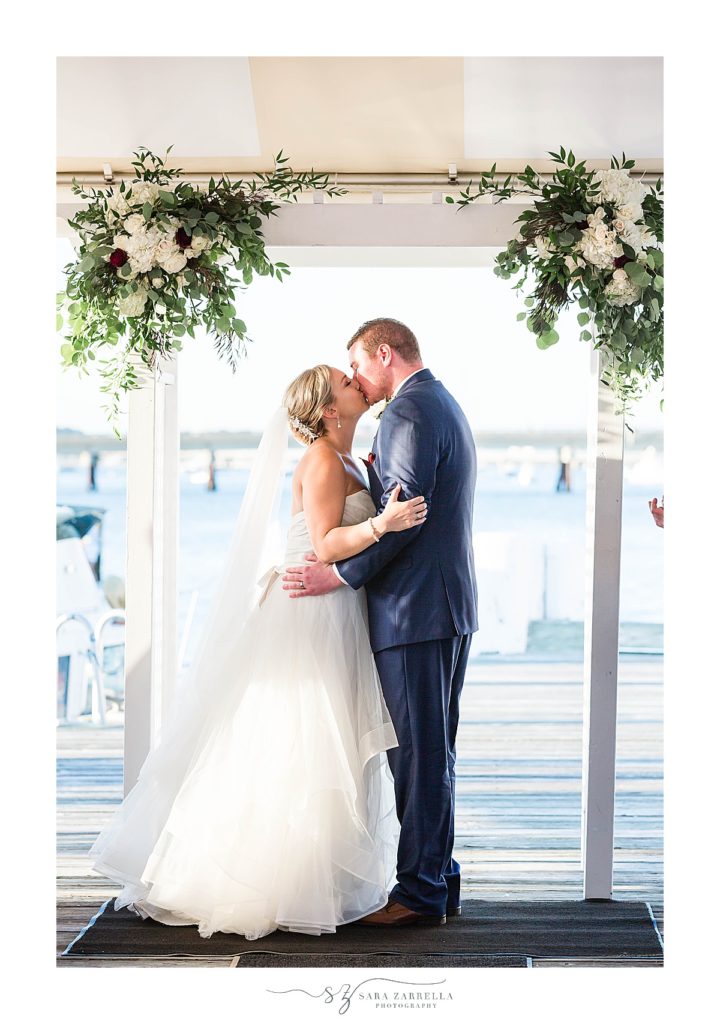 first kiss at Regatta Place photographed by Sara Zarrella Photography