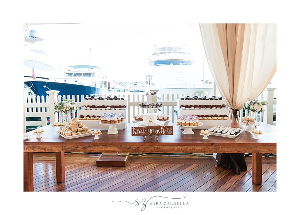 Dessert table at Regatta Place filled with desserts by Sin Desserts