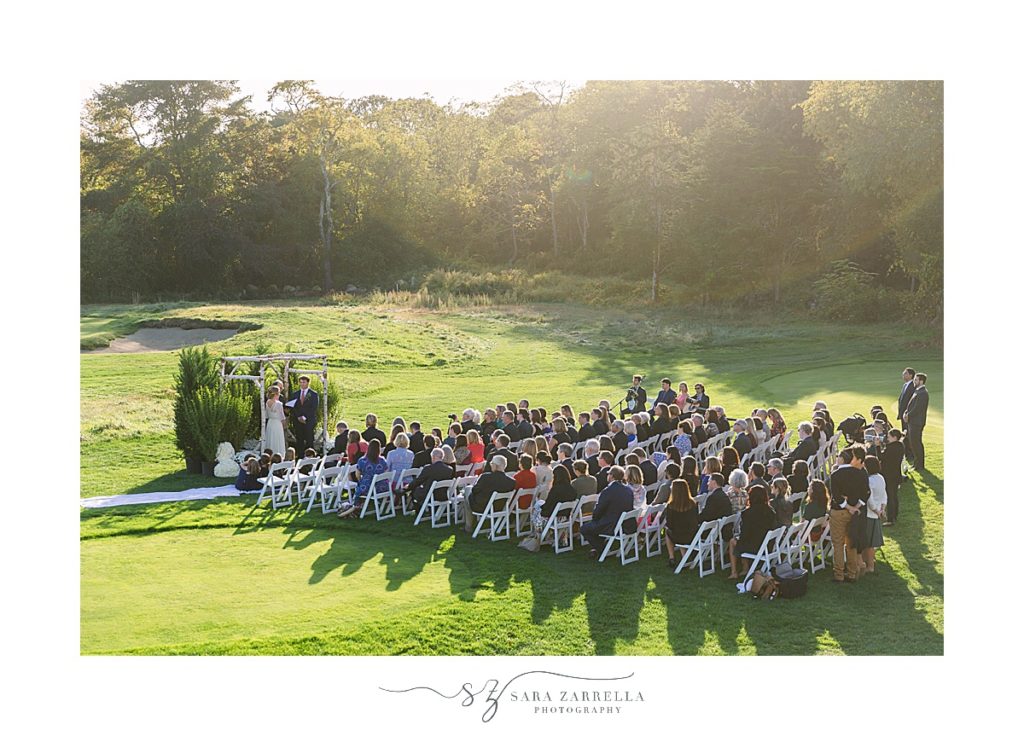 outdoor Weekapaug Golf Club wedding ceremony with Sara Zarrella Photography