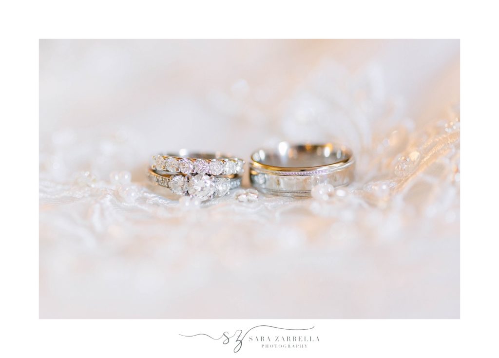 classic rings on veil photographed by Sara Zarrella Photography
