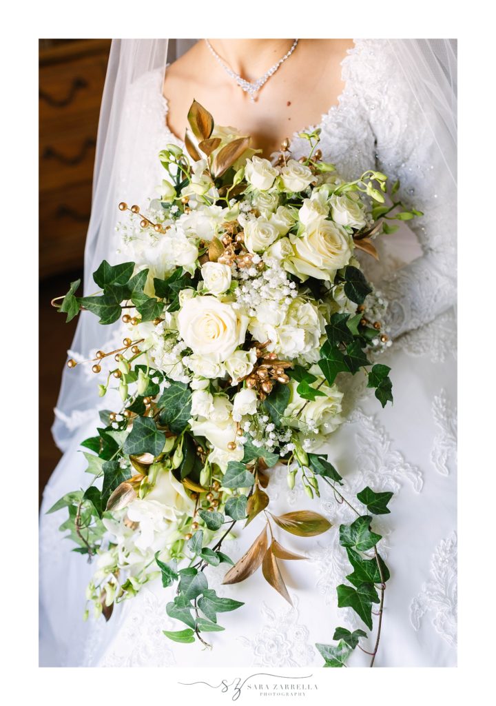 Sara Zarrella Photography photographs gold and white wedding bouquet for winter bride