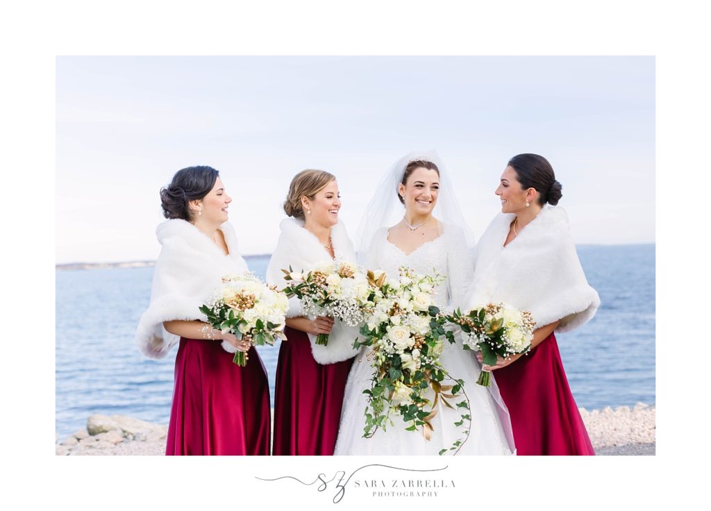 Sara Zarrella Photography captures bridesmaids smiling at the bride