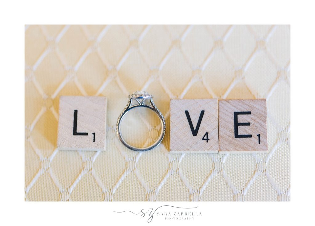 Sara Zarrella Photography captures wedding ring with Scrabble letters