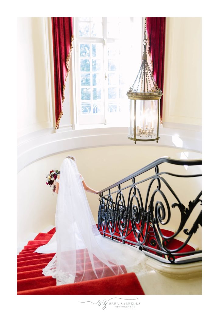 bridal portraits on the staircase of Glen Manor House with Sara Zarrella Photography