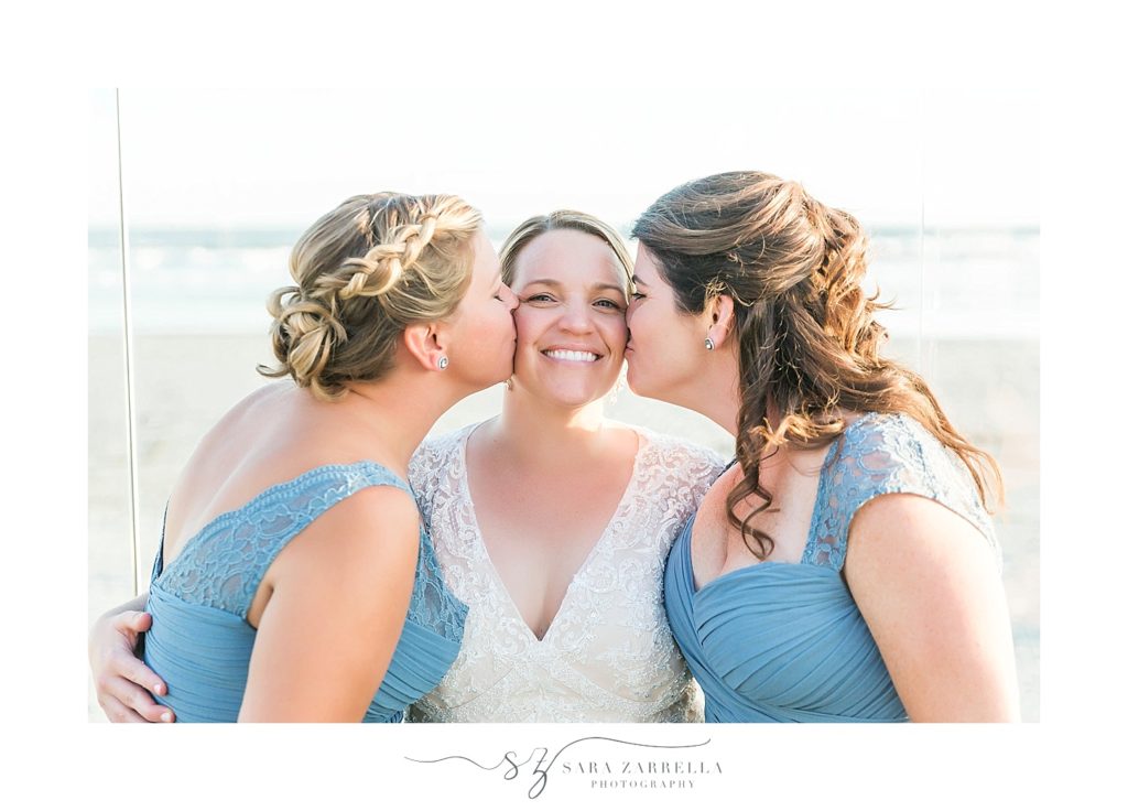 bride poses with bridesmaids on Newport Beach with Sara Zarrella Photography