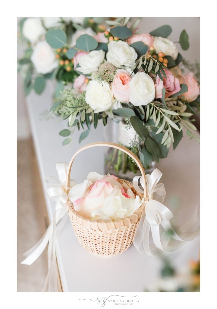flower girl's basket and wedding bouquet photographed by Sara Zarrella Photography