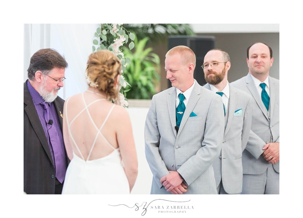 Sara Zarrella Photography captures bride and groom during ceremony