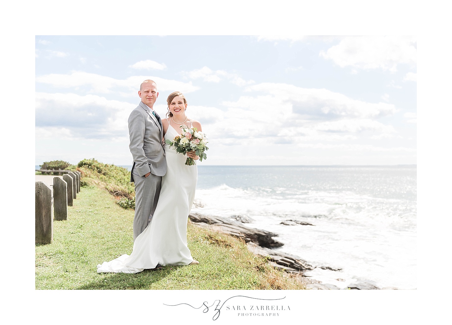Sara Zarrella Photography captures bride and groom at Brenton Point along water