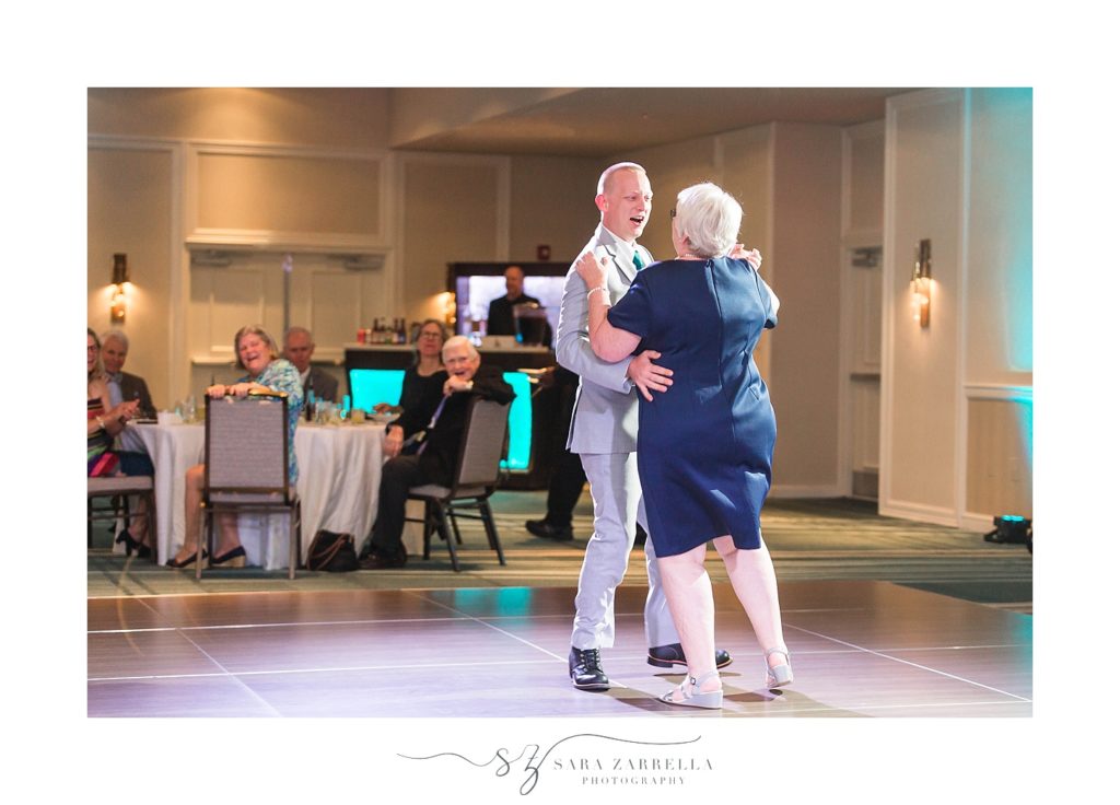groom and mother dance at Newport Marriott wedding reception photographed by Sara Zarrella Photography