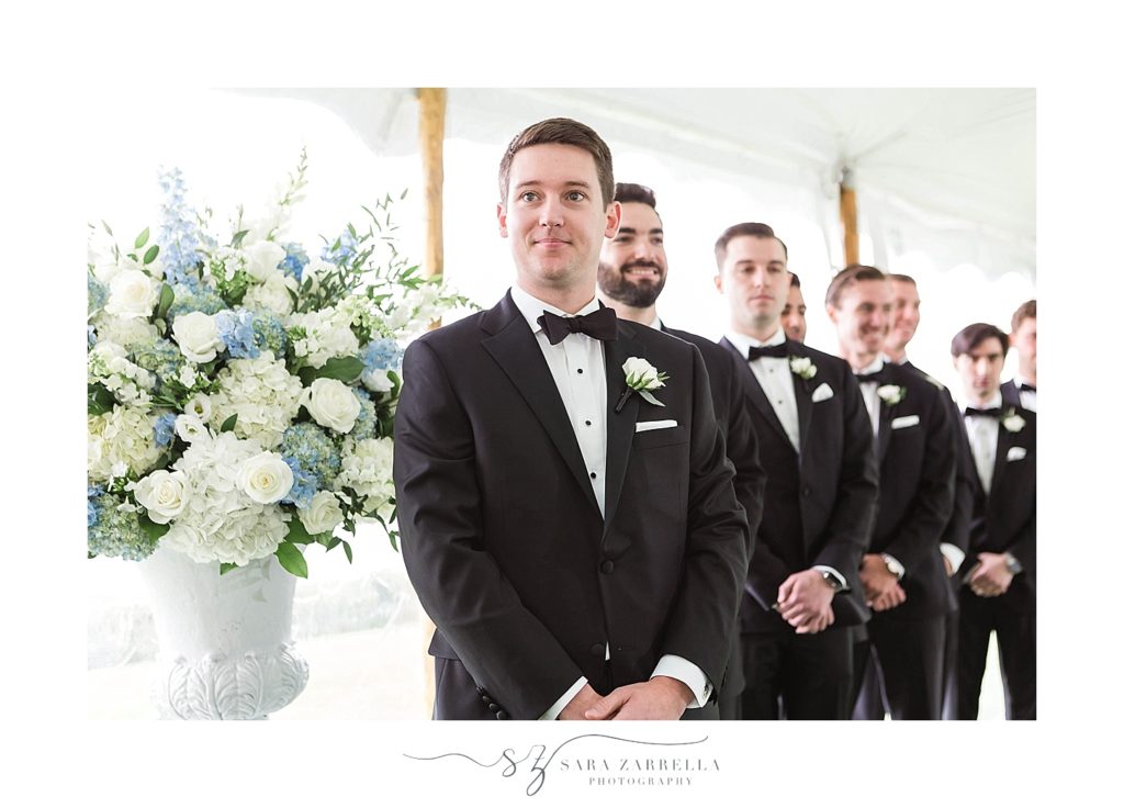 groom smiles at soon-to-be-wife photographed by Sara Zarrella Photography