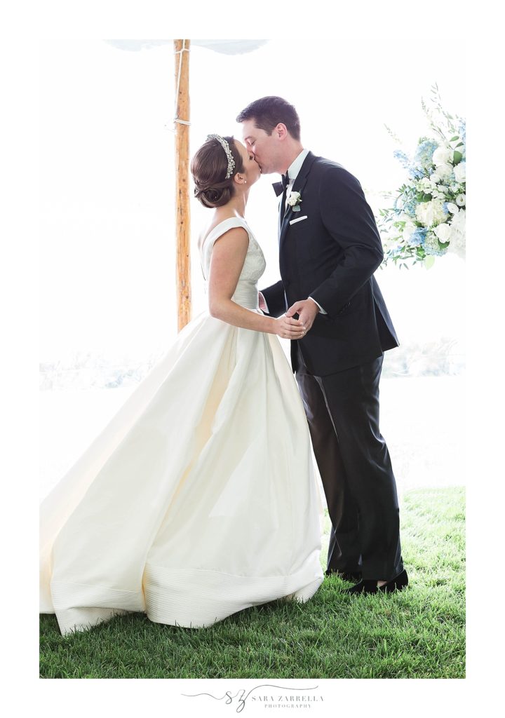 first kiss during ceremony at the Chanler with Sara Zarrella Photography