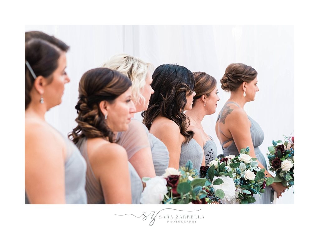 emotional bridesmaids watch wedding ceremony photographed by Sara Zarrella Photography