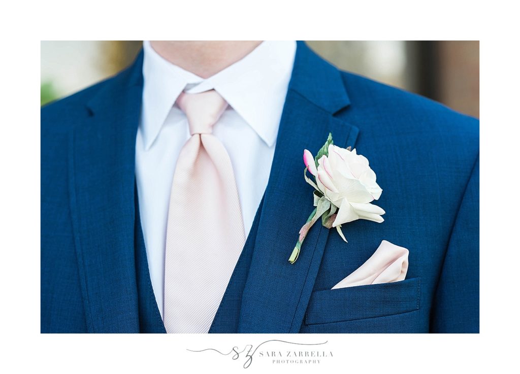 groom's ivory boutonniere photographed by Sara Zarrella Photography 
