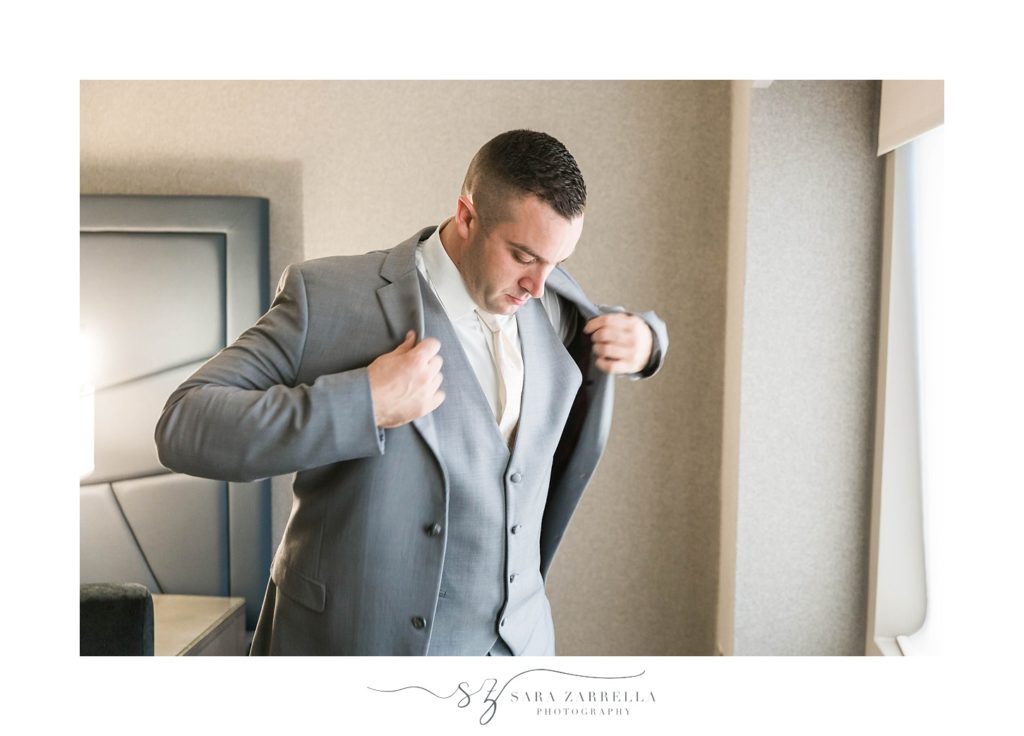 Sara Zarrella Photography captures groom preparing for Warwick wedding day