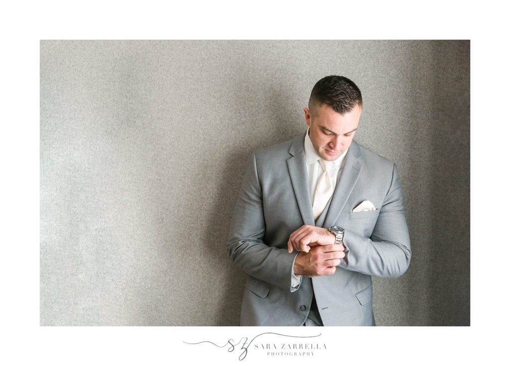 Sara Zarrella Photography photographs groom preparing for RI wedding
