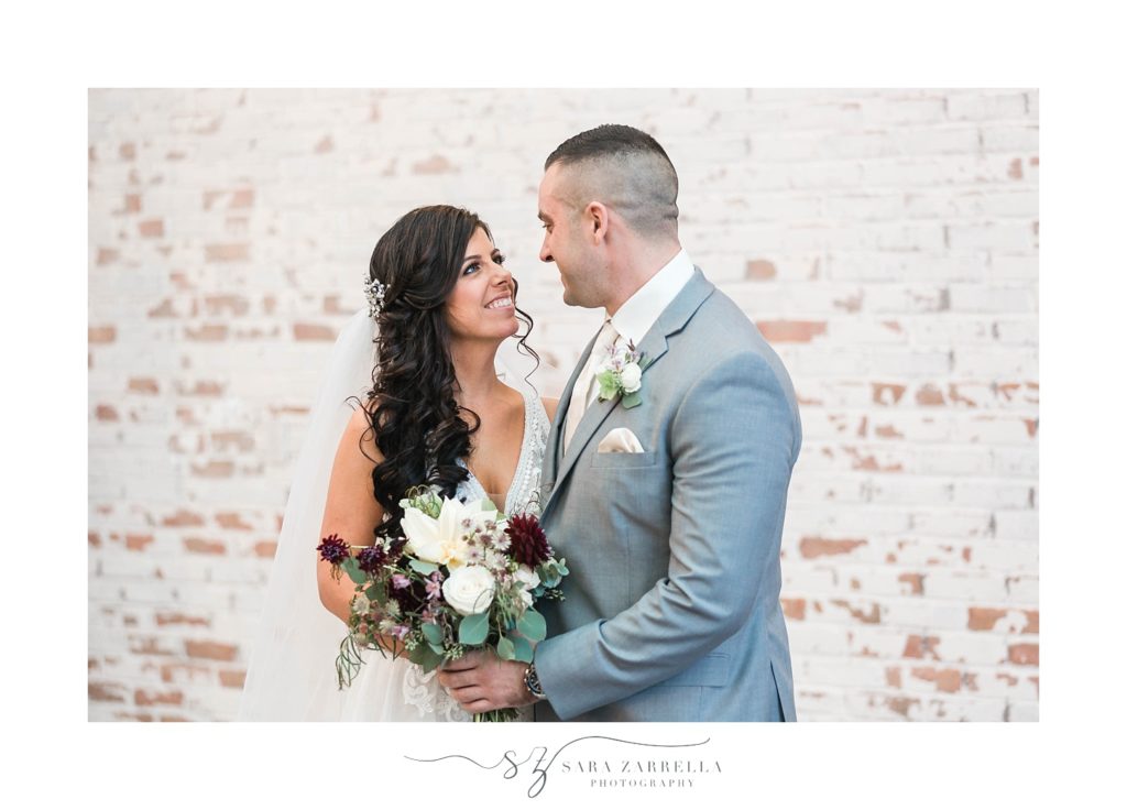 Sara Zarrella Photography captures bride and groom in Crowne Plaza atrium in Warwick RI